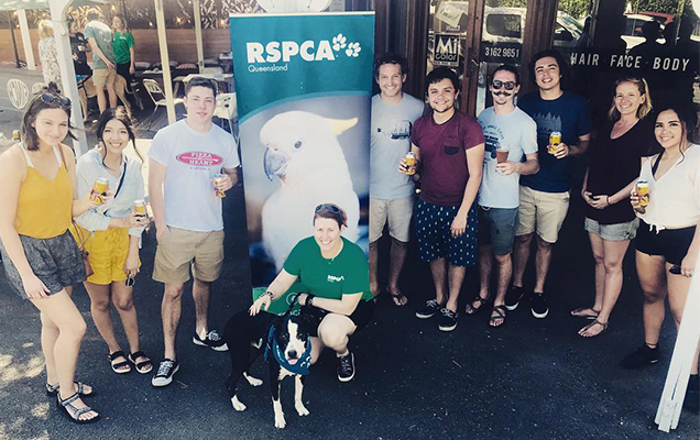 Group photo of people enjoying RSPCA Pale Tail Beer
